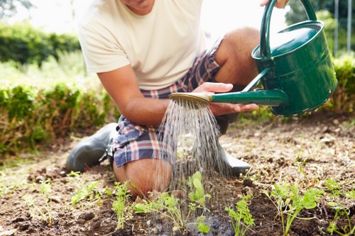 Gardener planning a maintenance schedule with tools and notes
